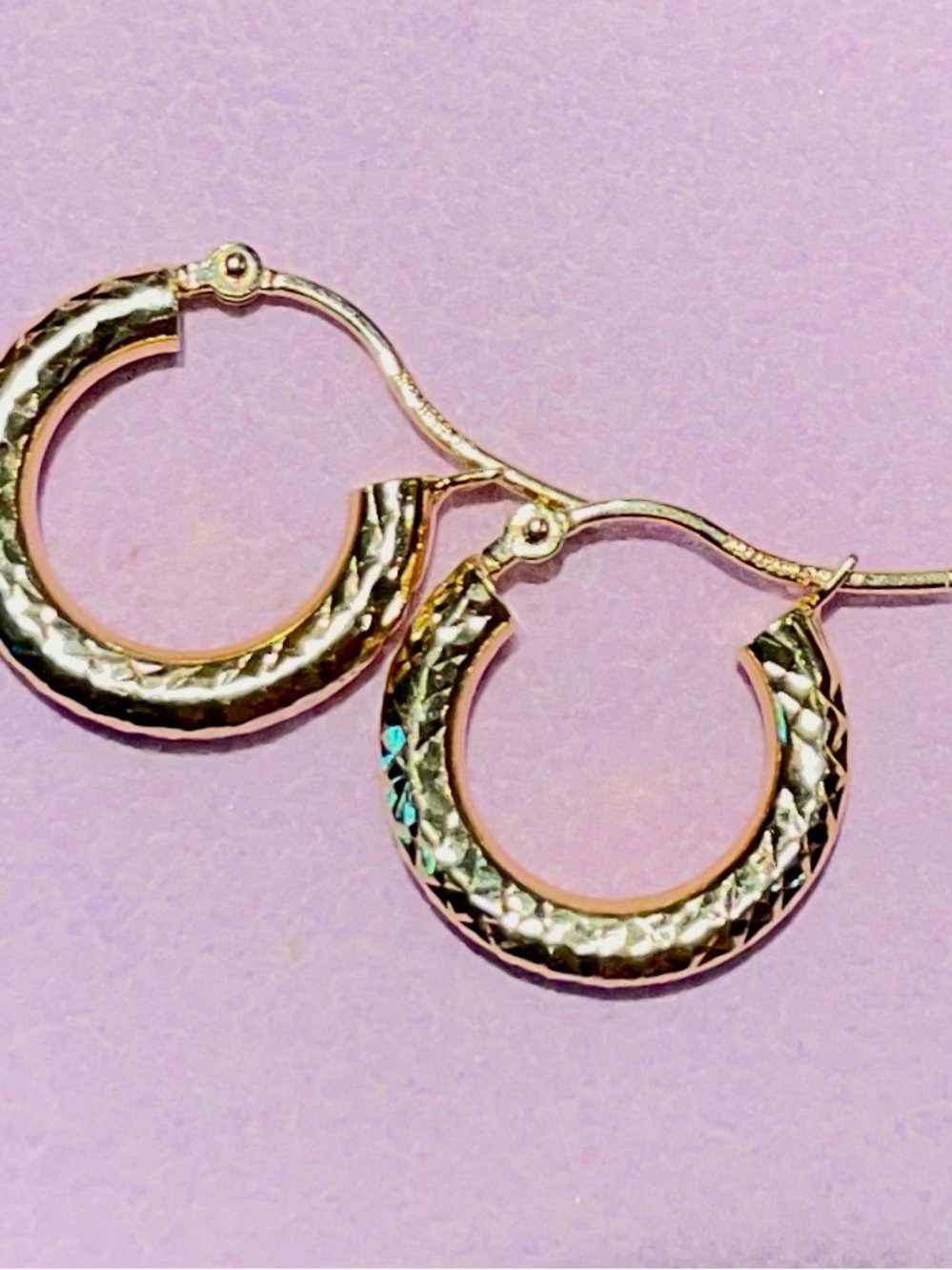 14k Solid Yellow Gold Diamond
Cut Textured Round Hoop Earrings
Marked